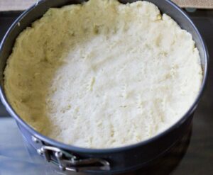 dough spread on spring pan