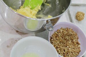 Dough, egg white and walnuts.