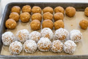 Cookie truffles rolled in coconut.