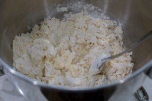 Adding water to forma dough