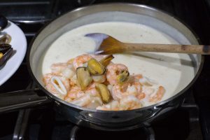 Adding seafood to the white sauce