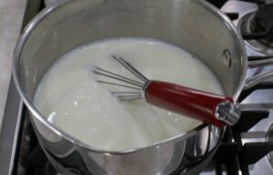 Milk and sugar in pan