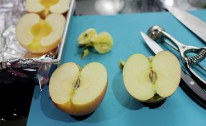 Preparing the apples.