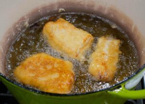 frying fish in hot oil