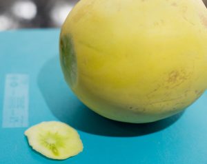 Small cut on the end of honeydew melon