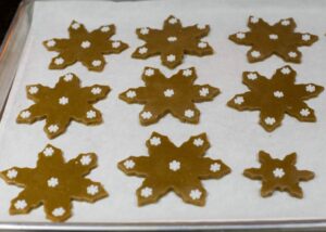 Cookie sheet with raw cookies.
