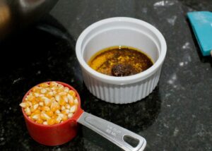 Melted butter and corn for popcorn