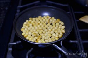 Sauteing chickpeas.