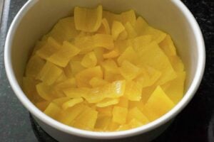 Chilean Papaya pieces on the bottom of the pan.