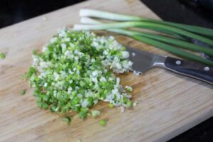 Chopped scallions.