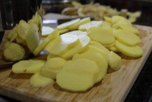 Sliced raw potatoes