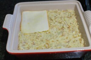 Cheese slice over the raw casserole