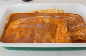 Marinating the pork.