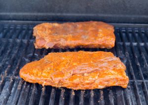 Grilling the ribs.