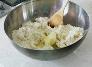 Forming the dough of potato and flour.