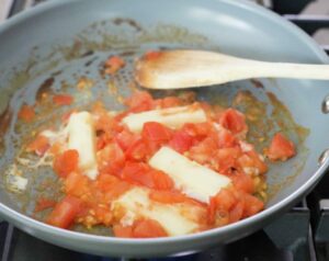 Cheese and tomatoes in a pan