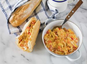 Scrambled eggs with cheese and tomatoes