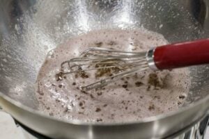 whisking the wine, egg whites and sugar