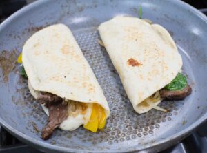 Making quesadillas.