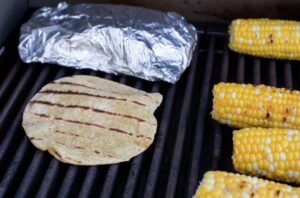 Grilling the tortillas.