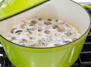 Milk with mushrooms in pot