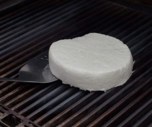 Grilling the queso fresco.