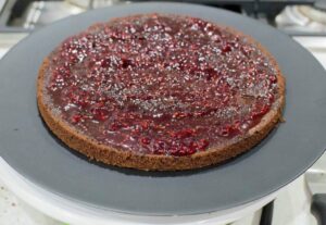 Layer of chocolate cake with raspberry jam.