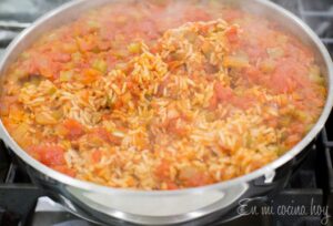 Rice cooked on a skillet.