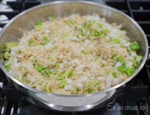 Rice and peppers sauteing.