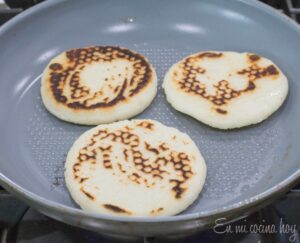 cooking arepas