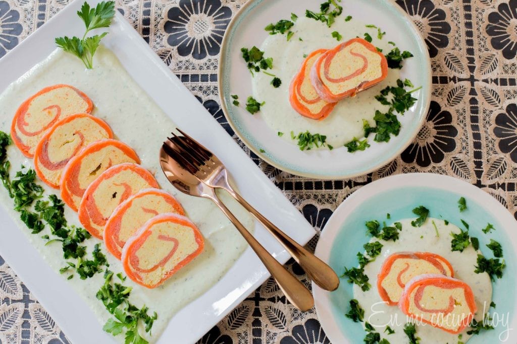 Smoked salmon roulade with cream cheese and avocado cream