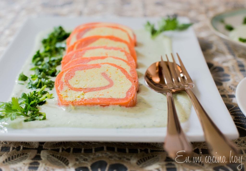 Smoked salmon roulade with cream cheese and avocado cream