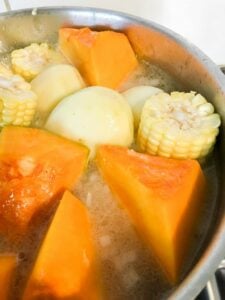 Boil corn and squash