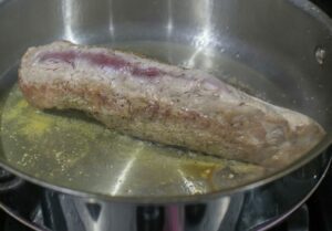Searing the pork tenderloin