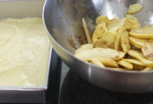 Batter and slices of apple.