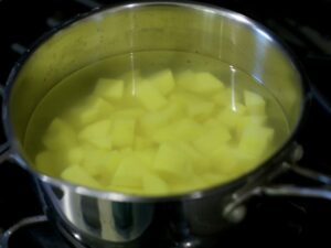 Cubed potatoes in a pan