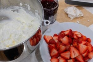 Whipped cream, jam, strawberries