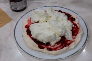 Meringue, jam and whipped cream