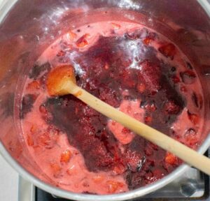 Cook down plum jam.
