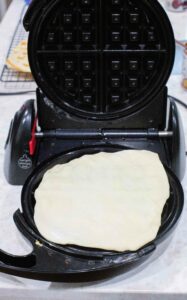 waffle dough on the maker