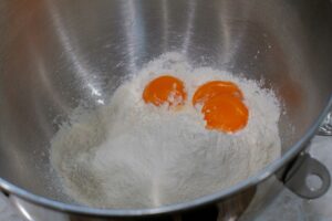 Egg yolk over flour