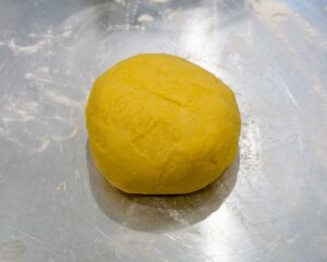 Alfajor dough shape into a ball