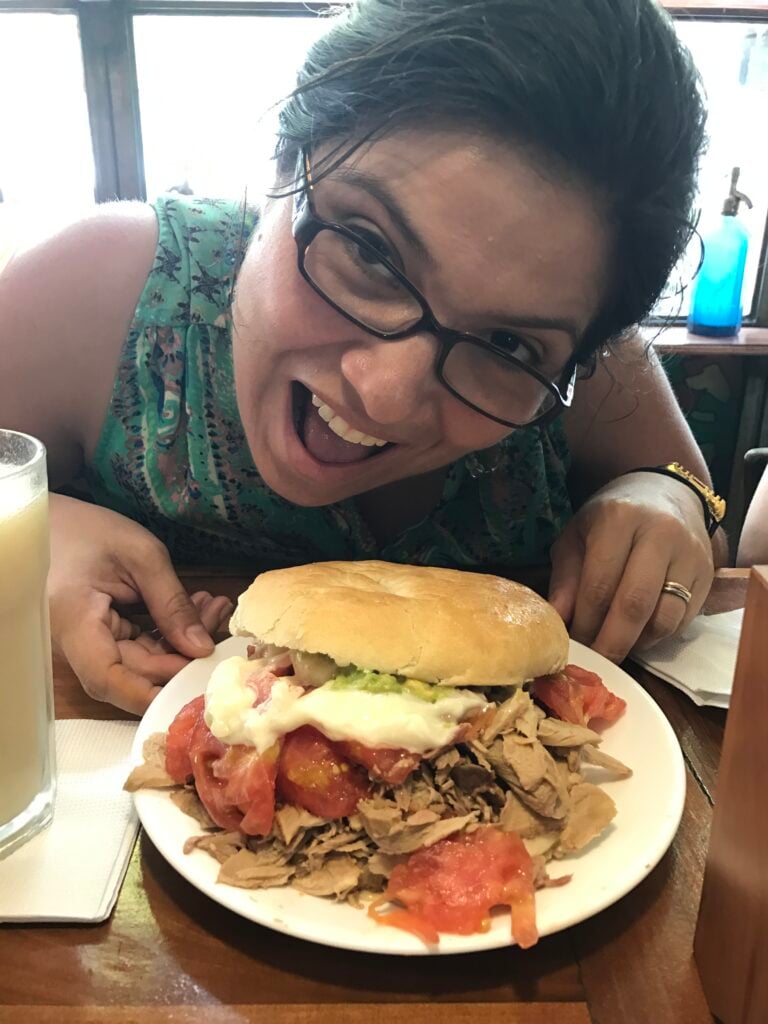 Pilar eating a Lomito in Chile