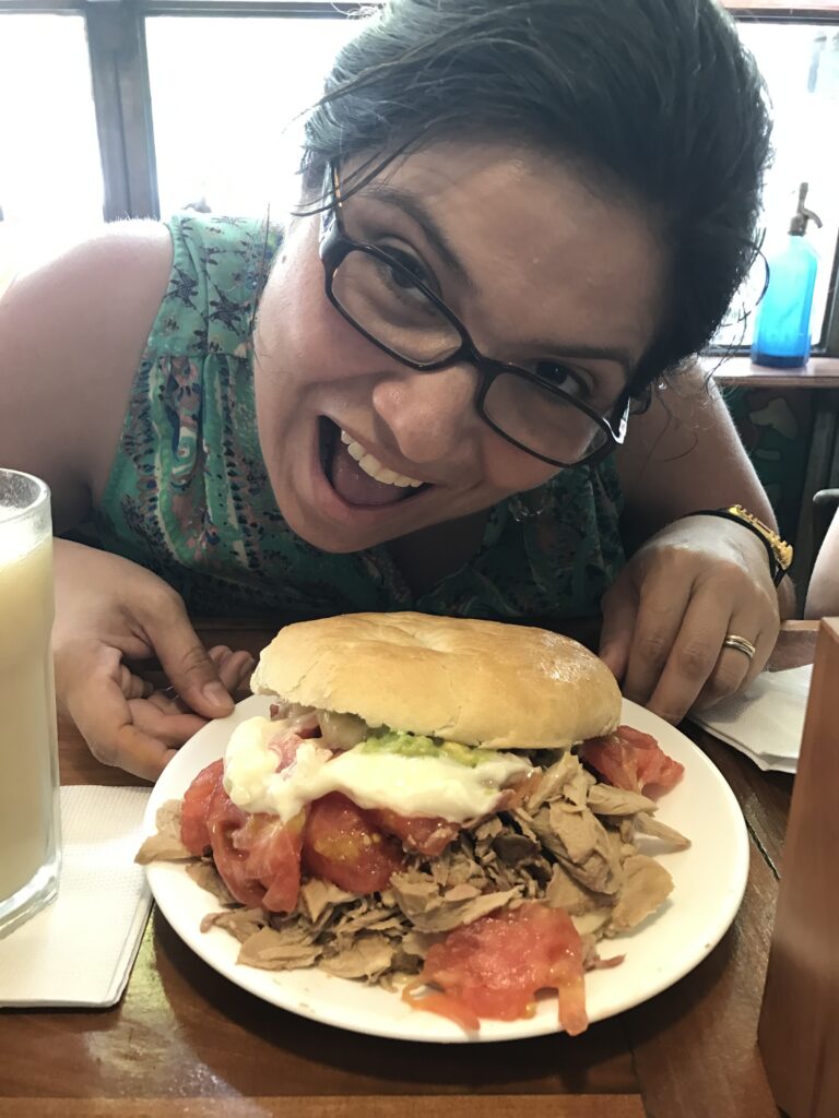 Pilar eating a Lomito in Chile