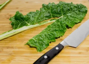 Cutting and chopping chard.