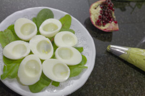 Filling the deviled eggs.